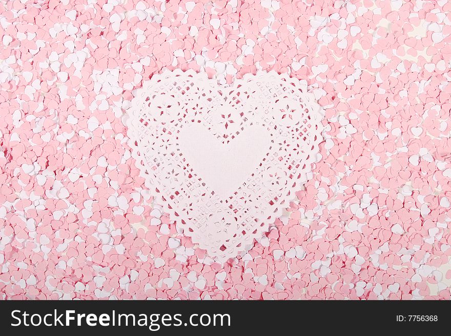 White and pink hearts around lace hearts