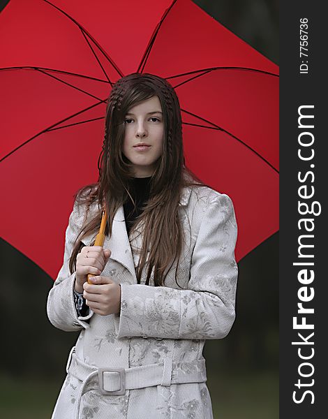 Young girl with red umbrella. Young girl with red umbrella