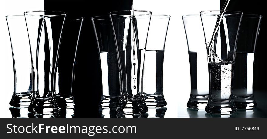 Still life with glasses on the black and white background