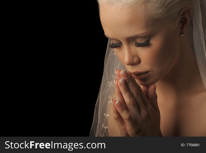 Beautiful Image of a New Bride praying on Black. Beautiful Image of a New Bride praying on Black