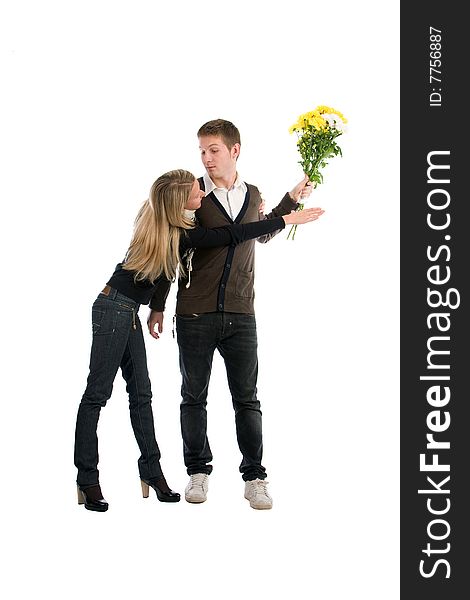 Appointment. The enamoured guy and the girl with a bouquet of yellow flowers