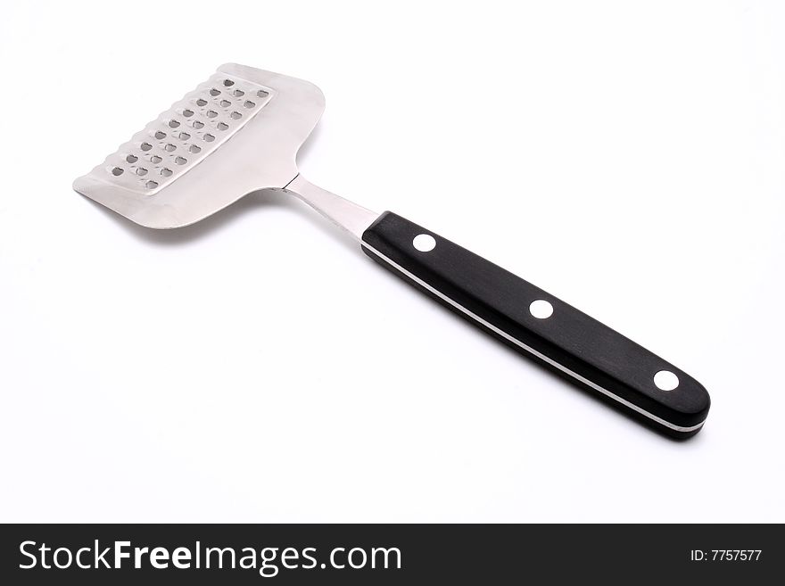 Scraper knife over a white background