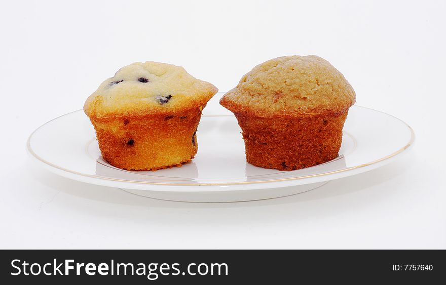 Blueberry and bran muffin, isolated on white. Blueberry and bran muffin, isolated on white