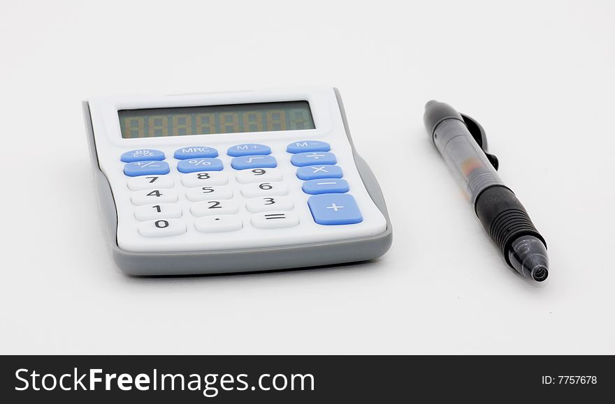 Macro image of calculator and pen, isolated on white. Macro image of calculator and pen, isolated on white