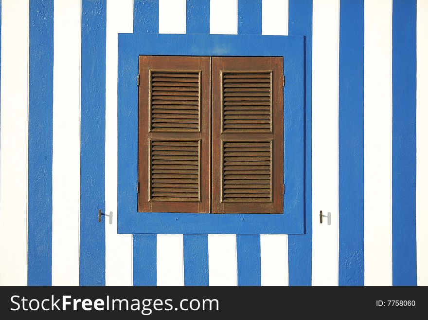 Window with white and blue background wall