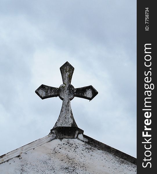 Old cross on the roof of the crypt. Old cross on the roof of the crypt