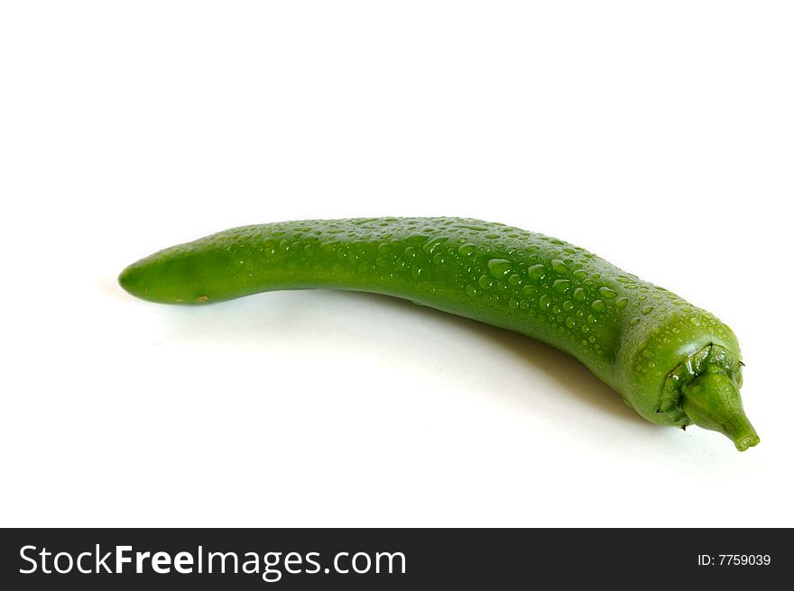 Green hot chili pepper isolated on white