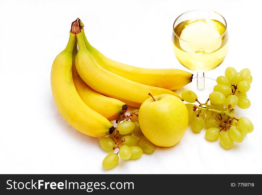 Collection of fruits and white wine as delicious snack. Collection of fruits and white wine as delicious snack