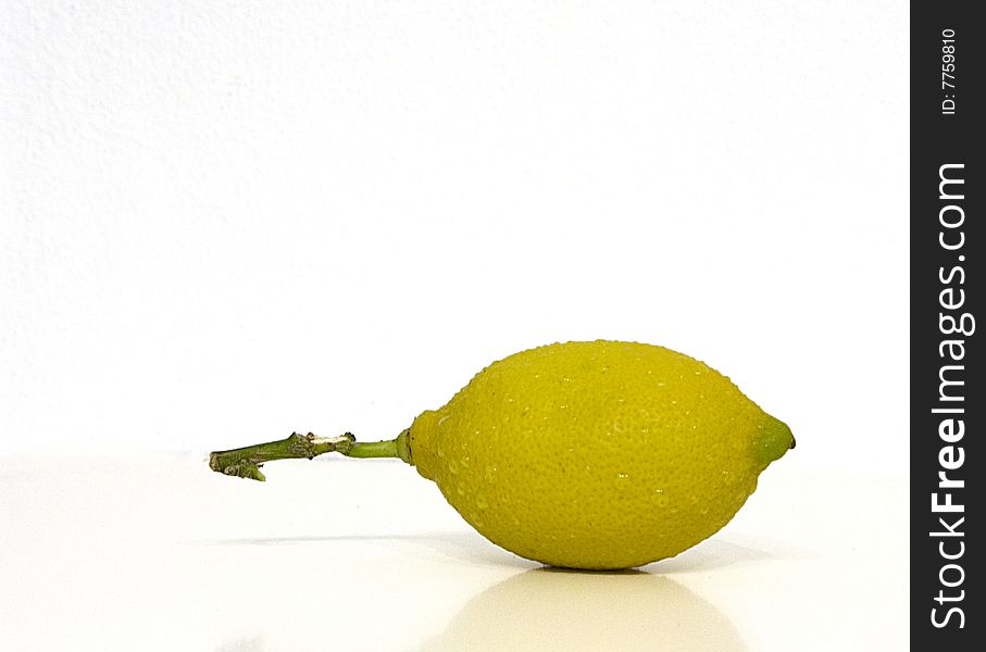 One small Lemon isoleted over a white backgroud