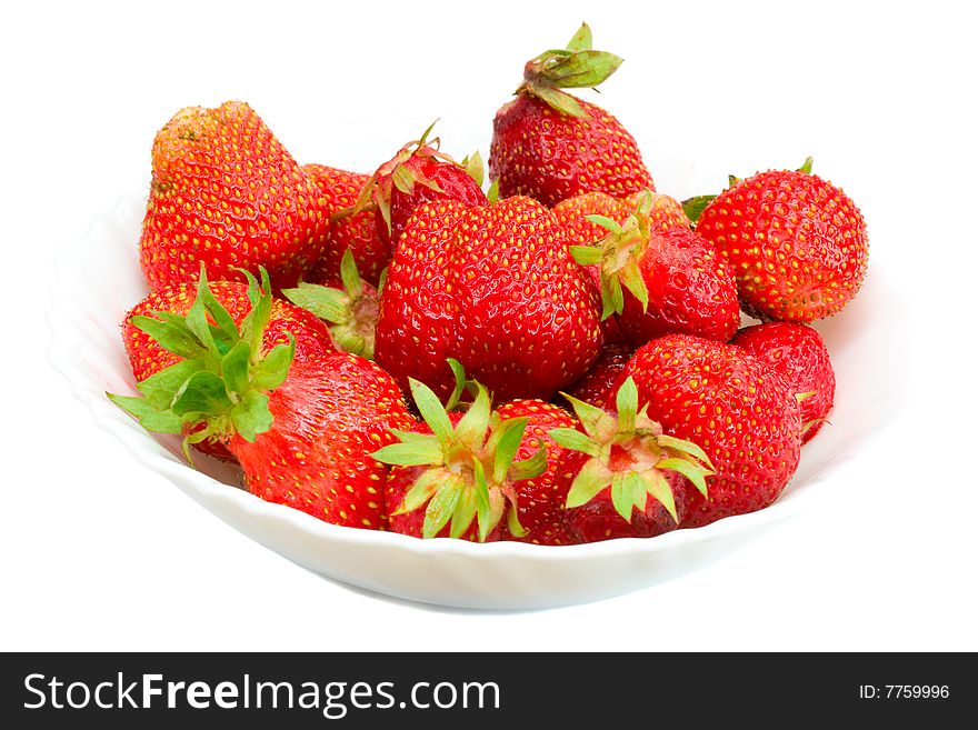 Close-up of ripe strawberries on plate, isolated over white background. Close-up of ripe strawberries on plate, isolated over white background