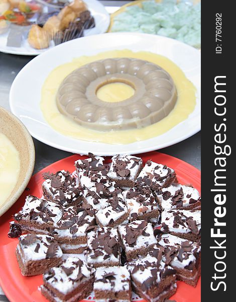 Black forest and Pudding on the plate for buffet. Black forest and Pudding on the plate for buffet