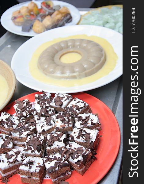 Black forest and Pudding on the plate for buffet. Black forest and Pudding on the plate for buffet