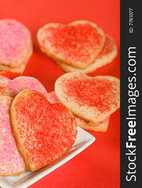 Heart shaped cookies in red, pink, and lavender