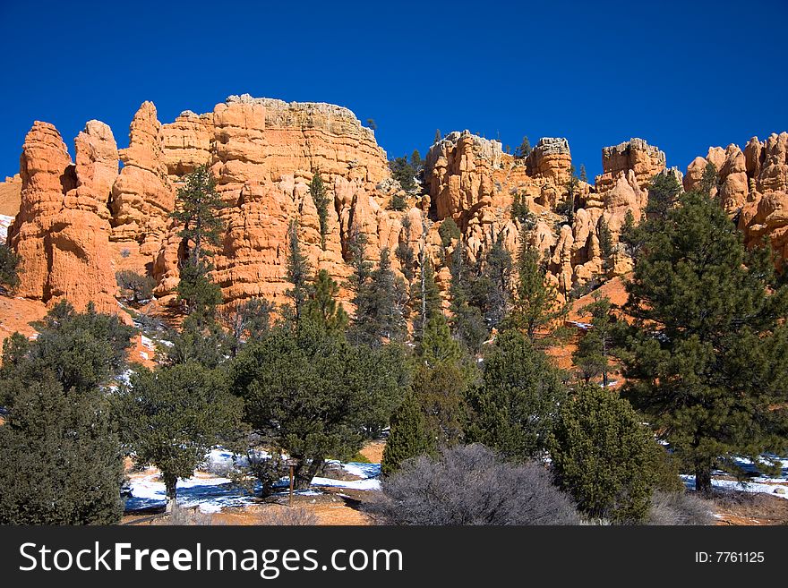 Red Canyon is located along Scenic Byway 12, just 9 miles from Bryce Canyon. Red Canyon is located along Scenic Byway 12, just 9 miles from Bryce Canyon.