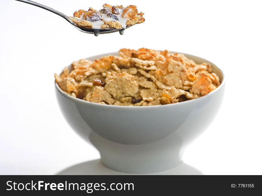 Bowl Of Cereal With Raisins And Milk