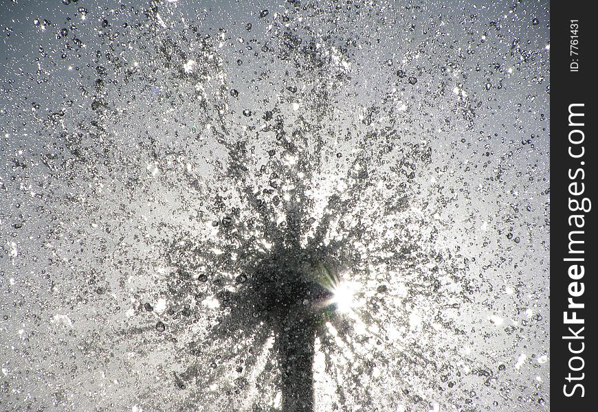 Jets of a fountain in a sunlight. Jets of a fountain in a sunlight