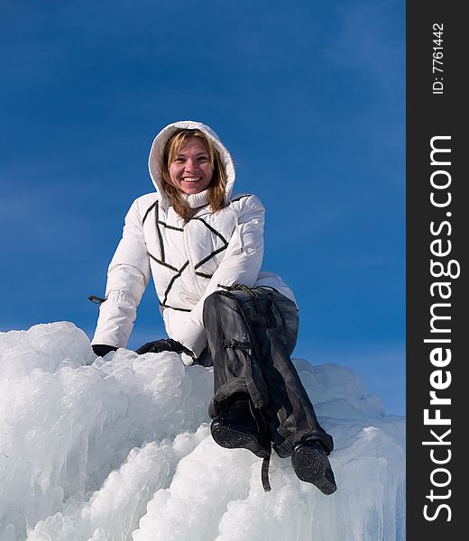 Girl sits on ice