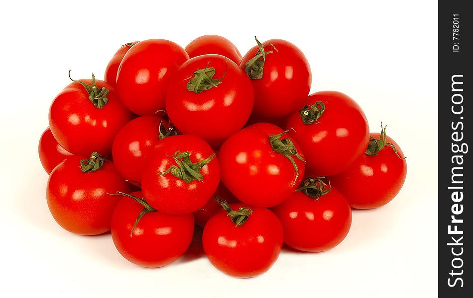 Red tomatoes isolated at white