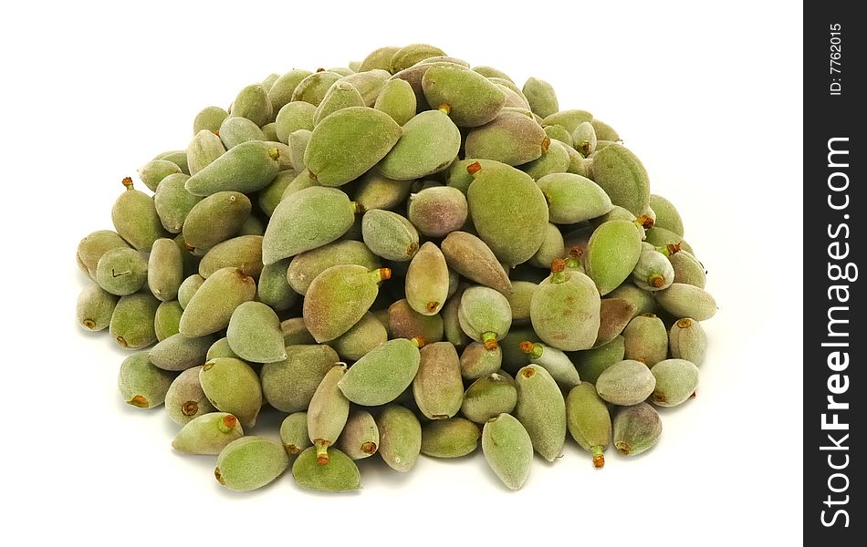 Green almonds isolated at white