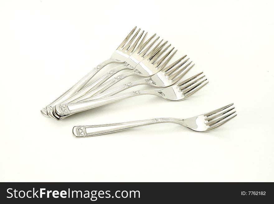 A lot of forks at white