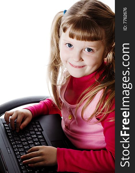 Stock photo: an image of a girl with a black laptop. Stock photo: an image of a girl with a black laptop
