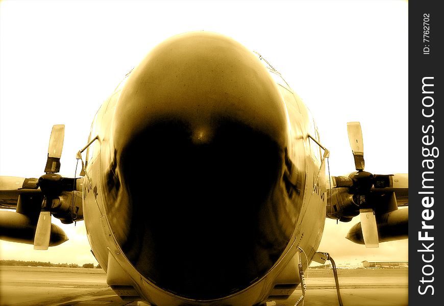 C 130 airplane Belgian army on tarmac, (front view) in sepia color. C 130 airplane Belgian army on tarmac, (front view) in sepia color.