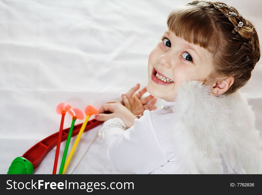 Stock photo: an image of a cupid with bow and arrows