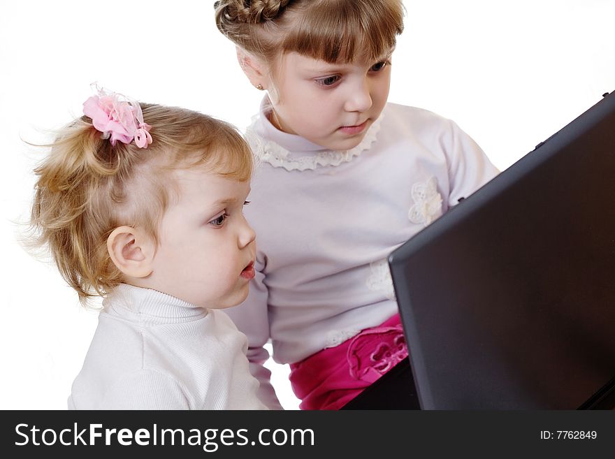 Stock photo: an image of two sisters with laptop
