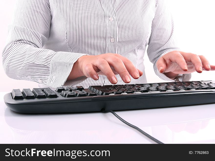 Woman typing on keyboard isolated on white