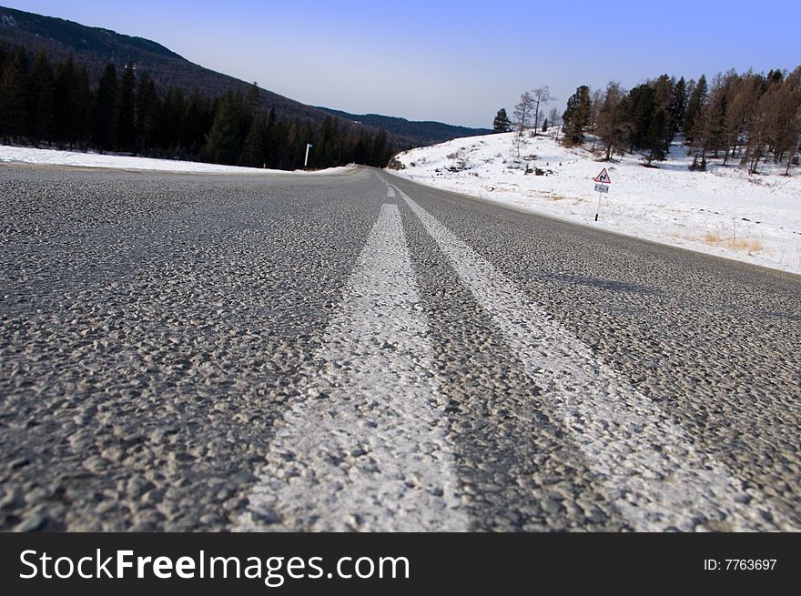 Dangerous turn on mountain road. Altay, Siberia.