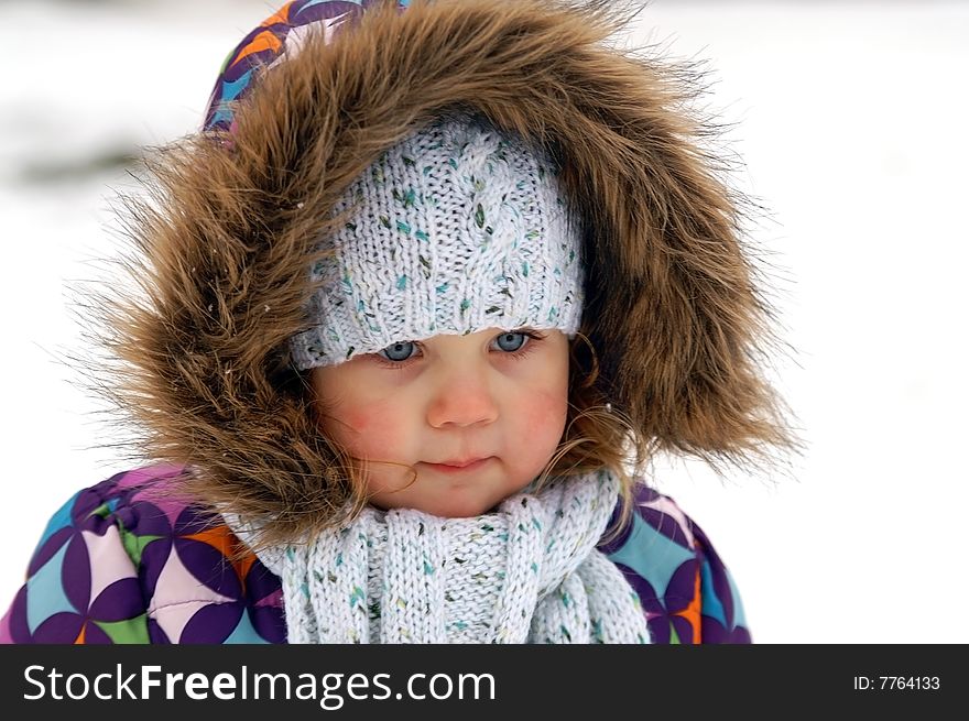 Winter portrait of smiling small girl. Winter portrait of smiling small girl