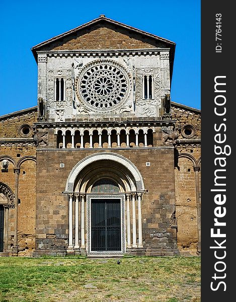 Italian basilica with rose window and ornate portal