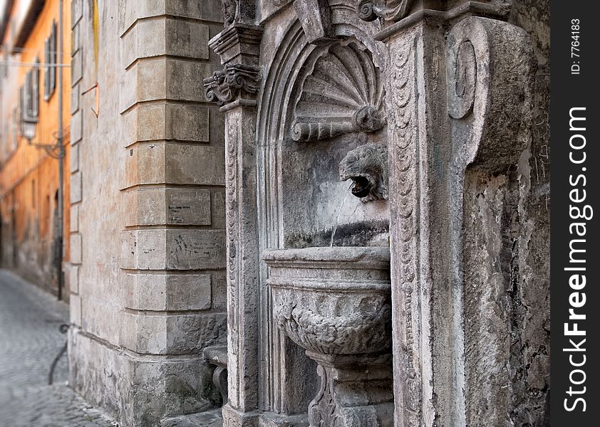 Antique Italian fountain with shallow depth of field