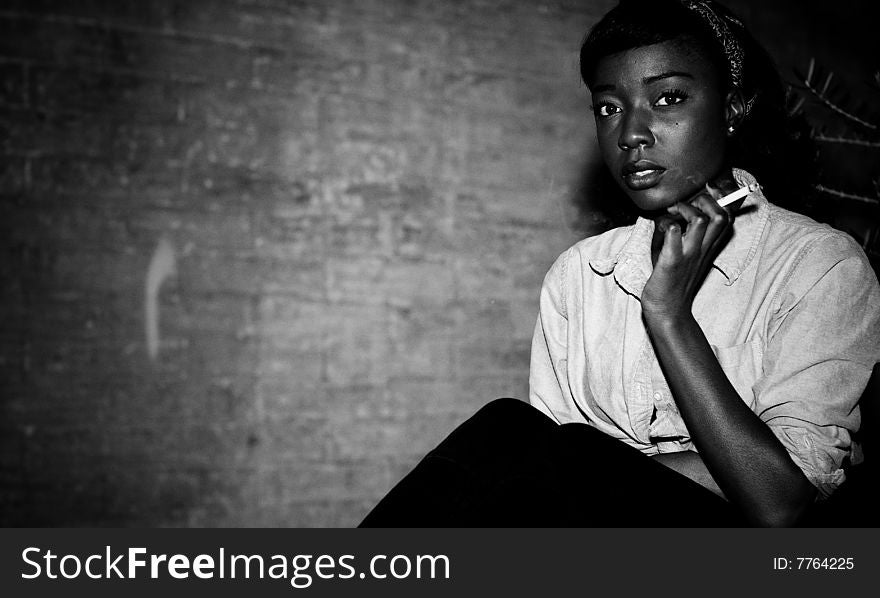 A young female model, photographed outside.