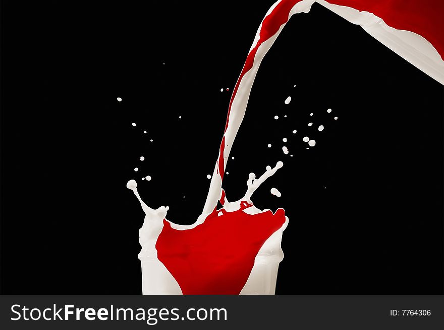 Blood and milk mixture on black background. Blood and milk mixture on black background