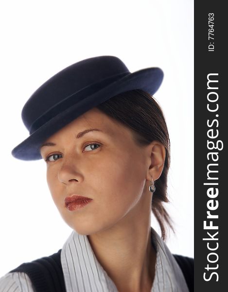 Young dark haired woman in 30's style hat. Young dark haired woman in 30's style hat