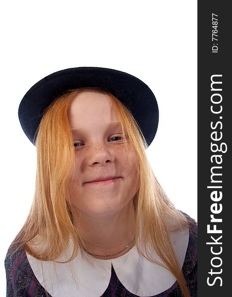 Portrait of the smiling redhead girl in the retro hat