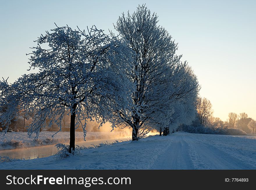 Foggy river during sunrise of a winters day. Foggy river during sunrise of a winters day