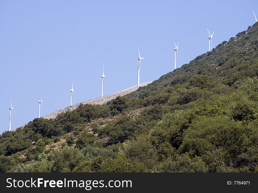 Wind Turbines Against Blue Sky
