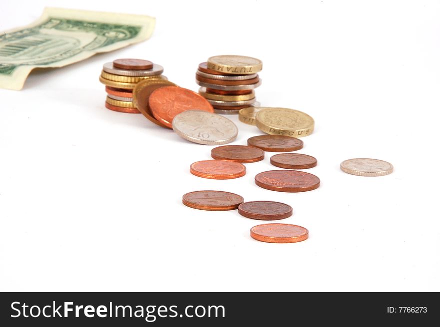 Five dollar paper money with worldwide coins isolated on the white background. Five dollar paper money with worldwide coins isolated on the white background.