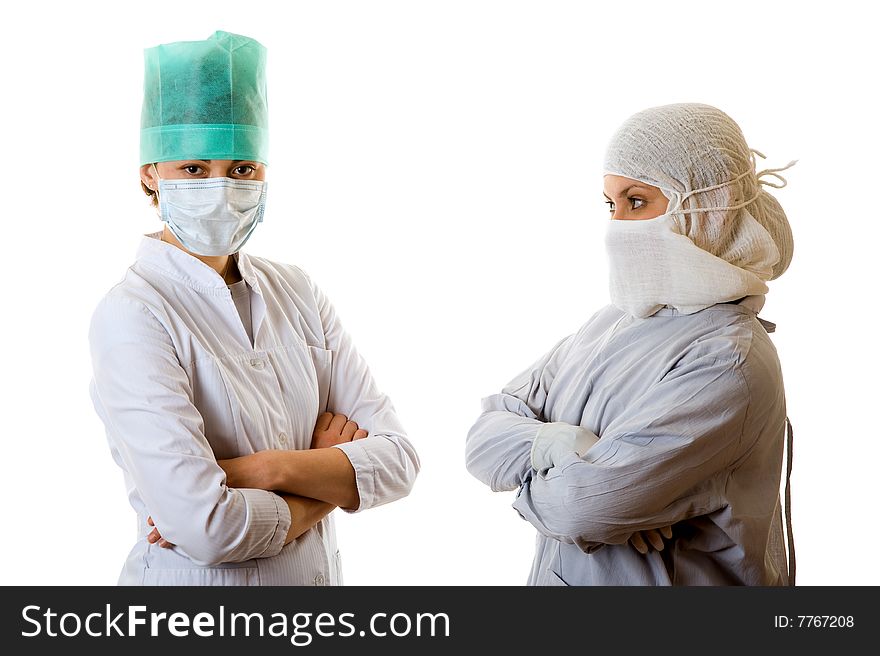 Portrait of two young doctors. Isolated on white background