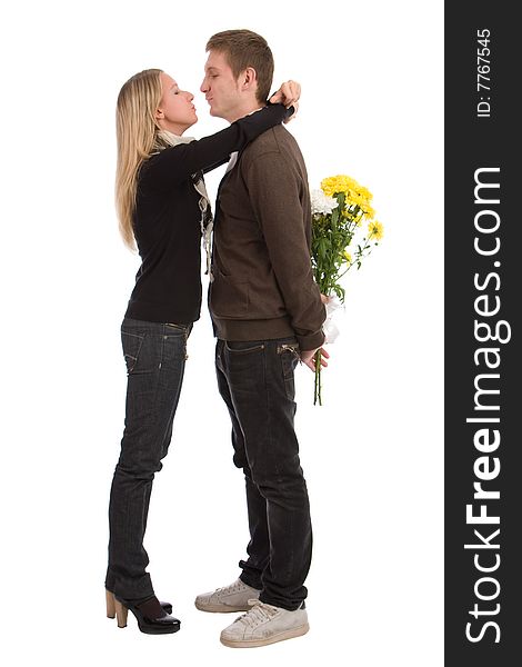 Appointment. The enamoured guy and the girl with a bouquet of yellow flowers. Appointment. The enamoured guy and the girl with a bouquet of yellow flowers.