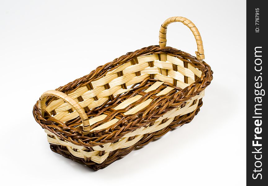 Bast Basket From Wooden Strips Of Yellow And Brown