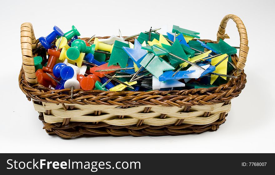 Bast basket with colored pushpins and tags