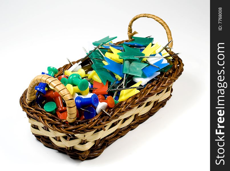 Bast basket with colored pushpins and tags