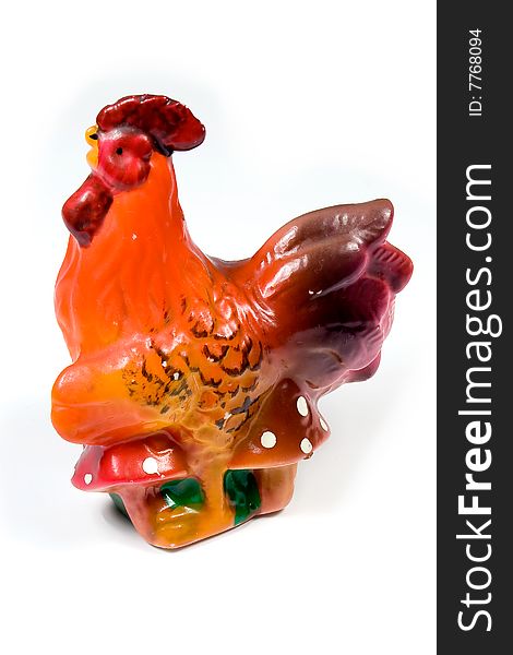 Saltcellar in the form of a cock on white