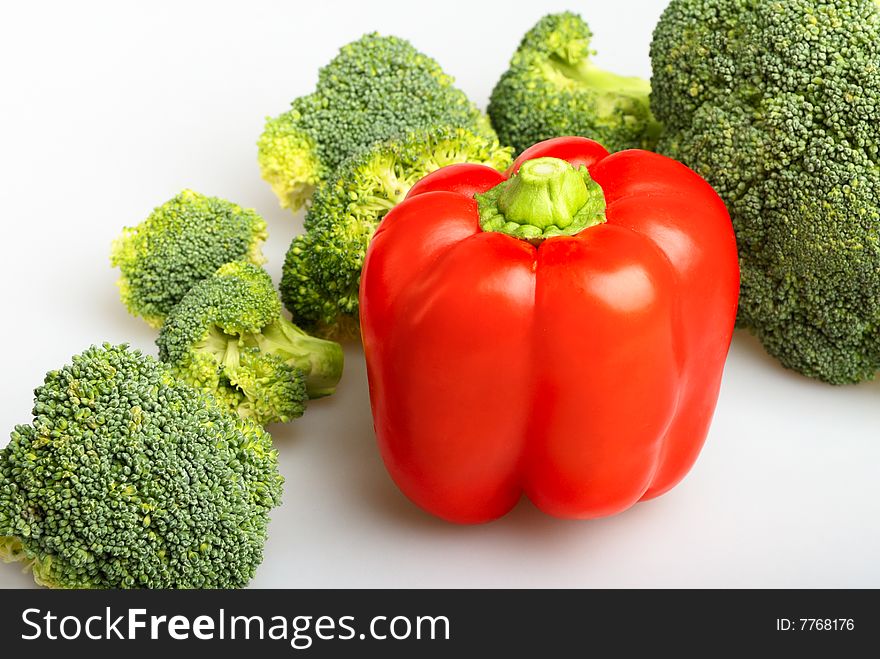 Green broccoli and red Bulgarian pepper. Green broccoli and red Bulgarian pepper