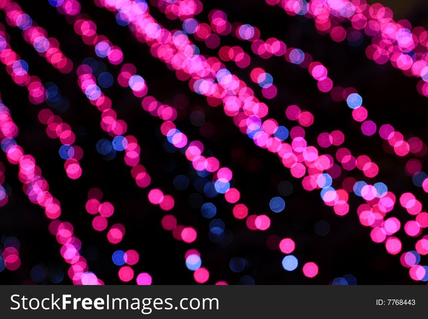 This is abstract background with unfocused lcolorful light sources