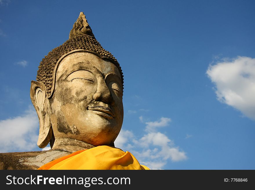 Wat Yaichaimongkol in Ayutthaya .
Buddha have smile on face.