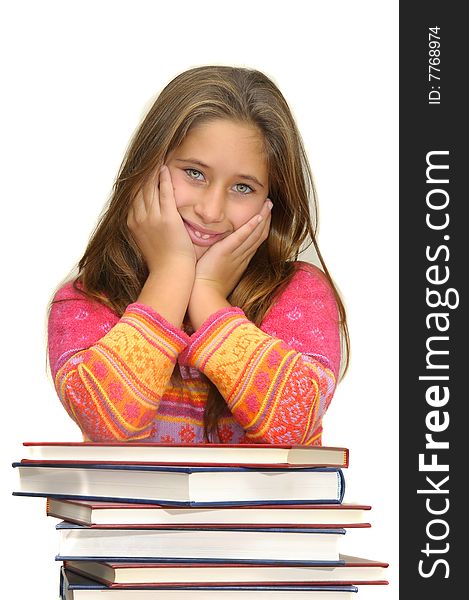 Beautiful young girl posing with books against a white background. Beautiful young girl posing with books against a white background